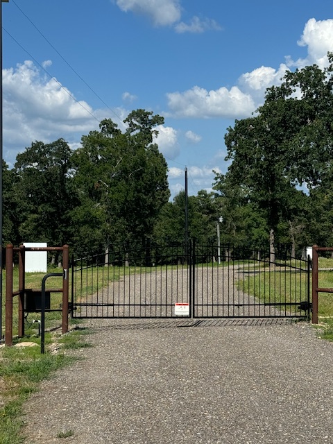 Gated entrance at Caney Trails RV Resort